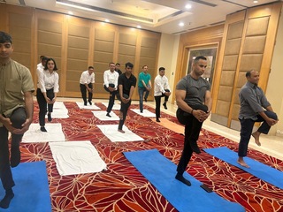 Yoga tourism training course students learning retreat management in India