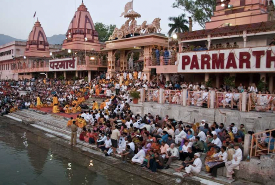 Participating in Ganga Aarti during yoga retreat in Rishikesh